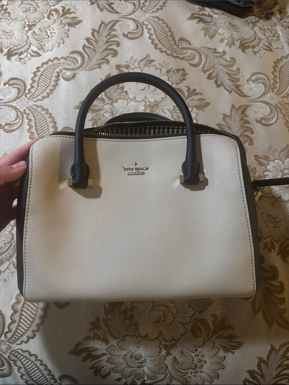 kate spade two-tone cream and black leather satchel with gold logo